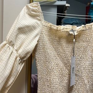 Cream/pale yellow dress